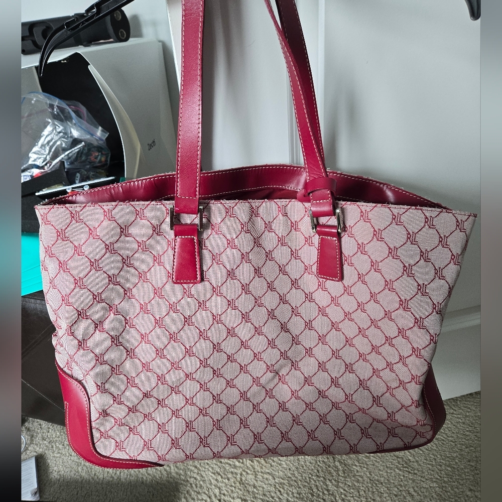Red Ralph Lauren Signature Duffle Bag does have a little wear